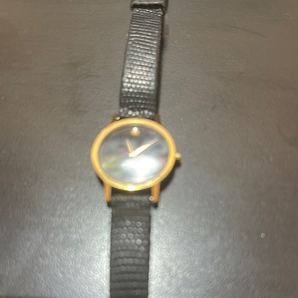Movado Gold and Black Contemporary Timepiece